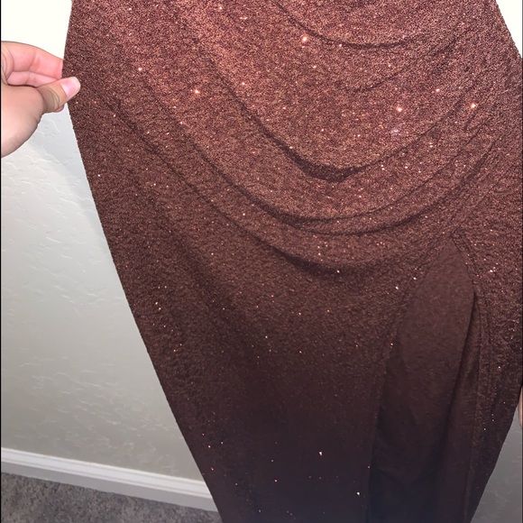 This is a brown/burgundy colored dress that has no holes or tears. So pretty! - Picture 3 of 5